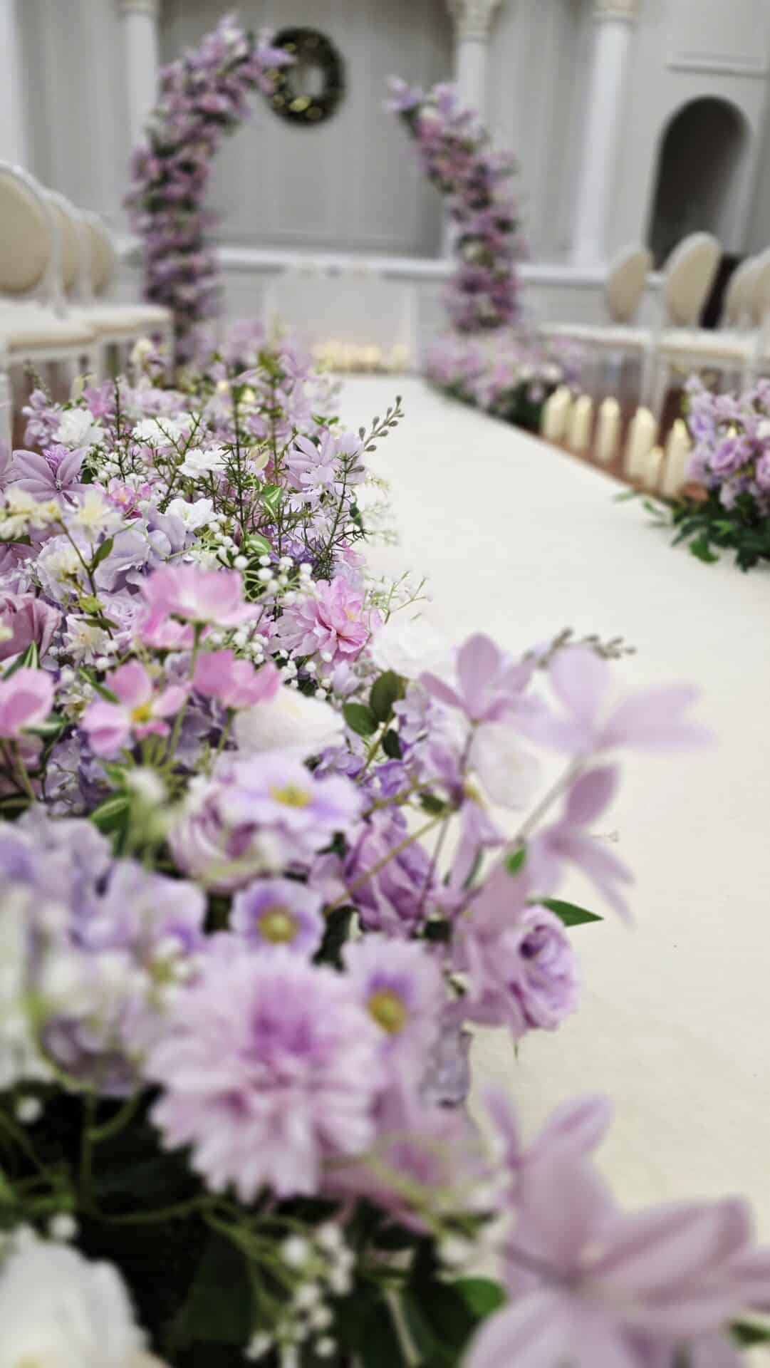 Luxury Purple and Lilac Floral setup at wedding ceremony in Tullyglass Hotel Northern Ireland